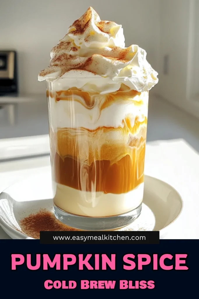 Indulge in the ultimate fall treat with this delightful Pumpkin Spice Cream Cold Brew! This easy-to-make recipe blends rich pumpkin puree with smooth cold brew coffee for a creamy and festive drink perfect for any occasion. In just 10 minutes, you can create a visually stunning layered beverage topped with whipped cream and a sprinkle of spice. Click through for the full recipe and elevate your coffee game! #PumpkinSpice #ColdBrew #FallRecipes #CoffeeLovers