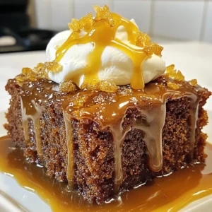 To make Toffee Gingerbread Pudding Cake, you need key ingredients that create its rich flavor and texture. Here&rsquo;s what you will need: - 1 &frac12; cups all-purpose flour - 1 tsp baking powder - 1 tsp baking soda - 1 tsp ground ginger - 1 tsp ground cinnamon - &frac12; tsp ground nutmeg - &frac12; tsp ground cloves - &frac14; tsp salt - &frac34; cup unsalted butter, softened to room temperature - 1 cup packed brown sugar - 2 large eggs, at room temperature - &frac12; cup unsulfured molasses - 1 cup buttermilk, at room temperature - 1 tsp pure vanilla extract - 1 cup chopped crystallized ginger - &frac12; cup toffee bits Each ingredient plays a special role. The all-purpose flour gives structure, while the spices add warmth. Butter and brown sugar together create a sweet, rich base. Eggs provide moisture and help bind everything. Molasses brings a deep flavor, and buttermilk ensures a soft crumb. The crystallized ginger adds a sweet and spicy kick, while toffee bits melt into pockets of deliciousness. When combined, these flavors create a cozy dessert perfect for the holidays. Enjoy crafting this delightful treat! {{ingredient_image_2}} - Preheat the oven to 350&deg;F (175&deg;C). - Grease a 9-inch round cake pan and dust with flour to avoid sticking. - Sift together 1 &frac12; cups of all-purpose flour, 1 tsp baking powder, 1 tsp baking soda, 1 tsp ground ginger, 1 tsp ground cinnamon, &frac12; tsp ground nutmeg, &frac12; tsp ground cloves, and &frac14; tsp salt. - Set this mixture aside. Letting the spices blend adds great flavor. - In a large bowl, cream together &frac34; cup unsalted butter and 1 cup packed brown sugar. - Beat them until light and fluffy, about 3-4 minutes. - Add 2 large eggs one at a time. Mix in &frac12; cup unsulfured molasses, 1 cup buttermilk, and 1 tsp pure vanilla extract until smooth. - Gradually mix the dry ingredients into the wet mixture. - Use a spatula to fold in 1 cup of chopped crystallized ginger and &frac12; cup of toffee bits. This adds nice texture and sweetness. - Pour the batter into the prepared pan. - Level the surface with a spatula for even baking. - Bake for 35-40 minutes. Check doneness with a toothpick. It should come out clean. - After baking, let the cake cool in the pan for about 10 minutes. - Carefully transfer it to a wire rack to cool completely. This helps the cake stay moist and fluffy. To make the best Toffee Gingerbread Pudding Cake, avoid over-mixing the batter. Over-mixing can make the cake tough. Mix gently until just combined. This keeps it light and fluffy. Using ingredients at the right temperature is key. Eggs and buttermilk should be at room temperature. This helps the batter blend smoothly and rise well. You can enhance the flavor by adding more spices. Try a pinch of ground allspice or cardamom for extra warmth. These spices will add depth to your cake. Choosing the right ginger type matters. Fresh ginger gives a bright flavor, while crystallized ginger adds sweetness. You can use both for a nice balance. For a stunning finish, serve your cake with homemade toffee sauce. To make it, melt equal parts butter and brown sugar with a splash of cream. Drizzle this warm sauce over each slice. Top your cake with whipped cream for a rich touch. A sprinkle of toffee bits adds a fun crunch. This makes your cake look even more inviting and festive. Pro Tips Use Fresh Spices: For the best flavor, make sure your ground spices are fresh. If they&rsquo;ve been sitting in your pantry for over a year, consider replacing them. Room Temperature Ingredients: Ensure that your butter, eggs, and buttermilk are at room temperature. This helps to create a uniform batter and improves the cake's texture. Don&rsquo;t Overmix: When combining the dry ingredients with the wet, mix until just combined. Overmixing can lead to a dense and tough cake. Storage Tips: To keep your cake fresh, store it in an airtight container at room temperature for up to three days, or refrigerate for up to a week. {{image_4}} If you want a gluten-free cake, you can swap all-purpose flour with a gluten-free blend. Make sure it has xanthan gum for the best texture. For a vegan option, use flax eggs instead of regular eggs. Combine one tablespoon of ground flaxseed with three tablespoons of water for each egg. You can also replace butter with coconut oil and use plant-based milk instead of buttermilk. To add a twist, mix in nuts like walnuts or pecans. Dried fruits such as cranberries or raisins can also enhance the taste. You can adjust the spice levels to fit your taste. If you like it spicier, add more ginger or cinnamon. For a milder cake, reduce the spices to your preference. Pair your cake with a scoop of vanilla ice cream or a serving of warm custard. This adds creaminess and balances the cake's rich flavors. For unique plating, serve each slice on a colorful plate. Drizzle toffee sauce over the cake and finish with whipped cream. Adding a sprinkle of toffee bits on top creates a fun texture. To keep your toffee gingerbread pudding cake fresh, store it in an airtight container. This helps keep moisture in and air out. You can keep it at room temperature for up to three days. If you want to store it longer, place it in the fridge. It will stay fresh there for about a week. When reheating, avoid drying out the cake. The best way is to use the oven. Preheat it to 300&deg;F (150&deg;C). Place a slice of cake on a baking sheet and cover it with foil. Heat it for about 10 minutes. This will warm the cake without losing its moist texture. To freeze your cake, first let it cool completely. Wrap it tightly in plastic wrap, then in foil. This keeps air away and prevents freezer burn. You can freeze it for up to three months. When you're ready to eat, take it out and let it thaw in the fridge overnight. This keeps the flavor and texture just right. Toffee Gingerbread Pudding Cake lasts about 3 to 5 days when stored properly. Keep it in an airtight container at room temperature. If you want it to last longer, refrigerate it. The cold will help preserve its moisture and flavor. Yes, you can make this cake ahead of time. Bake it a day or two before you need it. Just store it covered at room temperature. This cake actually tastes even better the next day as the flavors meld together. If your cake comes out too dry, try to brush it with some warm milk or a simple syrup. You can mix equal parts sugar and water, heat until dissolved, and then brush it over the cake. This adds moisture and sweetness. Yes, you can substitute molasses. Use honey, maple syrup, or agave nectar instead. Each will give a different flavor, but they will work well in the recipe. Just keep in mind that molasses adds rich color and depth. You can use fresh ginger instead of crystallized ginger, but the taste will change. Fresh ginger is spicier and less sweet. If you want to use fresh ginger, I recommend using less. About 1 tablespoon of grated fresh ginger should work nicely. You now have all the steps to make the perfect Toffee Gingerbread Pudding Cake. From choosing quality ingredients to baking and serving tips, each part plays a key role. Remember, keep your process smooth and avoid over-mixing. Experiment with flavors to make it your own. Enjoy storing the cake properly, so it stays fresh longer. This cake is a delightful treat that can bring joy to any occasion. Now, gather your ingredients, follow the steps, and get baking!
